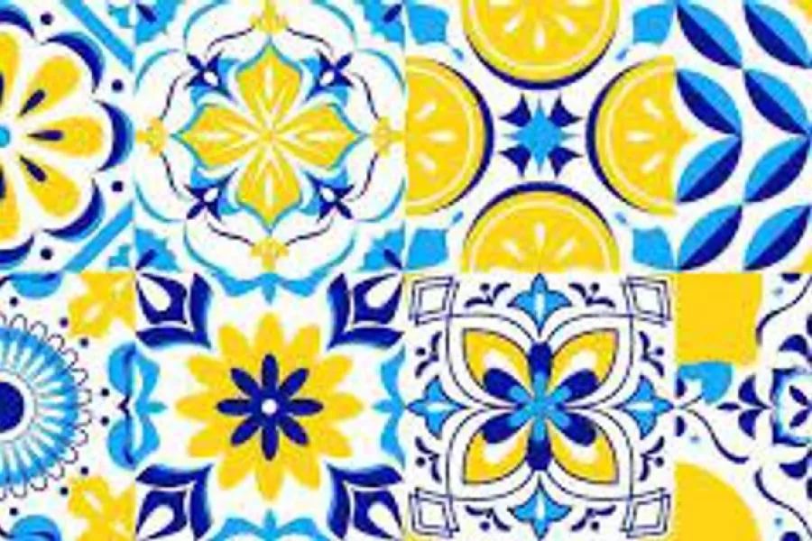 Imagen de una serie de azulejos en bloque con distintos diseños donde el común denominador son los colores celeste, blanco, azul y amarillo.
