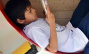 Niño leyendo Niño leyendo